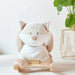 Children's rocking chair with a plush toy in the shape of a fox on a white background