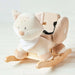Plush rocking horse toy with a cat design on a light background