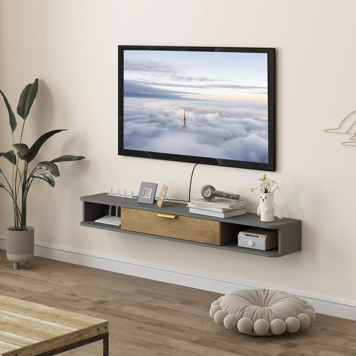 Modern living room with floating black and wood TV cabinet, wall-mounted flat screen TV, plant, and decorative items