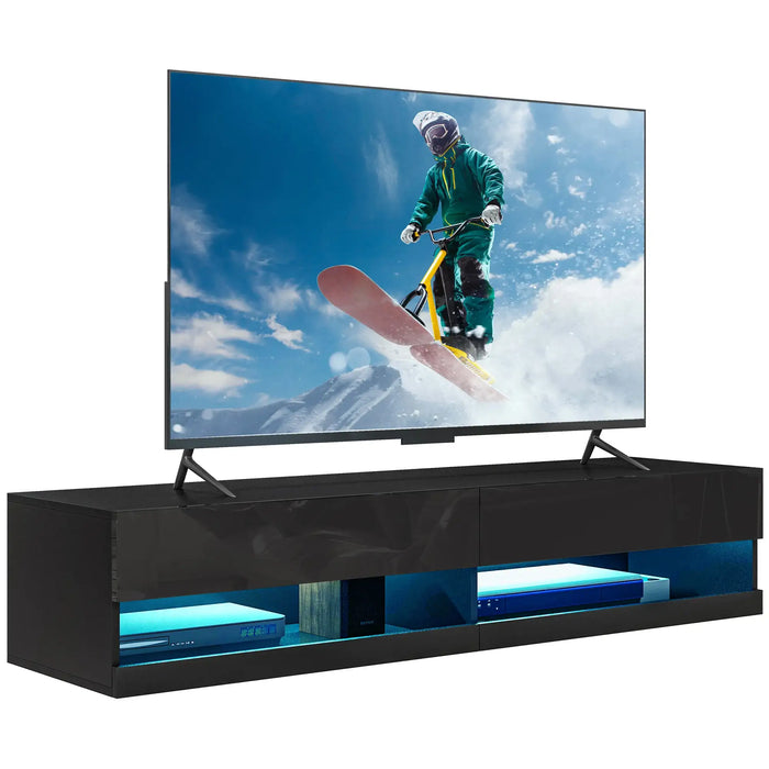 Black floating TV stand with LED lights holding a large flat-screen TV showing a snowboarder in action