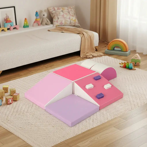 Children's play mat with cloud-shaped foam pieces on a wooden floor.