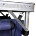 Foldable camping cupboard detail with metal frame and blue fabric storage compartments