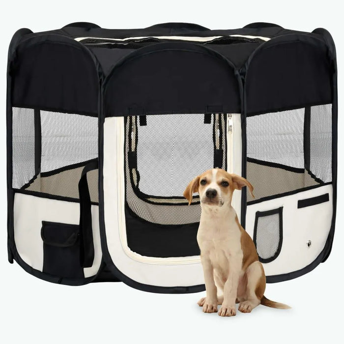 Foldable dog playpen with mesh panels in black and cream, small dog sitting in front