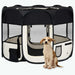 Foldable dog playpen with mesh panels in black and cream, small dog sitting in front
