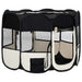 Foldable black and cream dog playpen with mesh panels and a zippered door