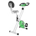 Green and white exercise bike on a white background