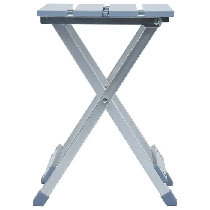 Silver folding aluminium camp stool with slatted seat and X-frame design, studio view.