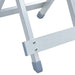 Close-up of folding aluminium camp stool legs with silver finish and grey rubber feet