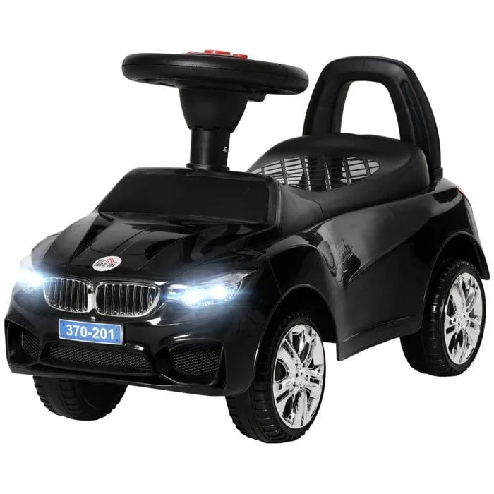 Black toddler ride-on car with flashing headlights, chrome wheels, and push steering wheel