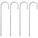 Set of four silver metal ground stakes with curved tops on white background