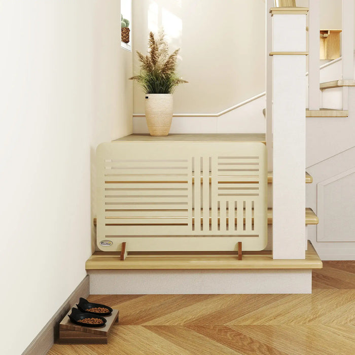 Beige radiator on a wooden platform with a plant and small bowl in a room.