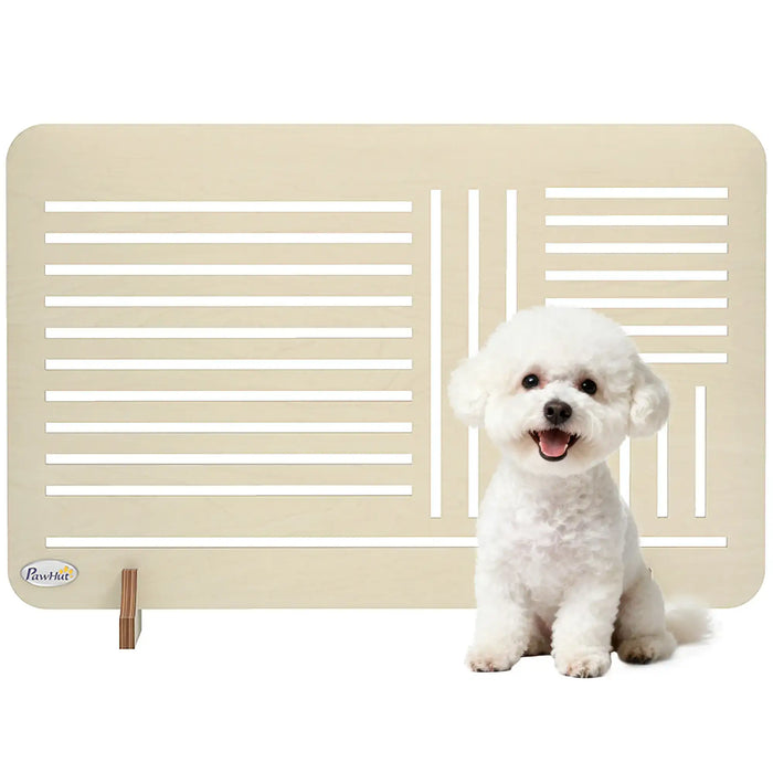 Small white dog sitting next to a beige pet gate on a white background