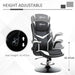 Black and white faux leather gaming chair with adjustable height and flip-up armrests