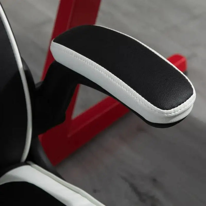 Black and white faux leather gaming chair armrest with flip-up feature