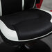 Black and white faux leather gaming chair seat with flip-up armrests
