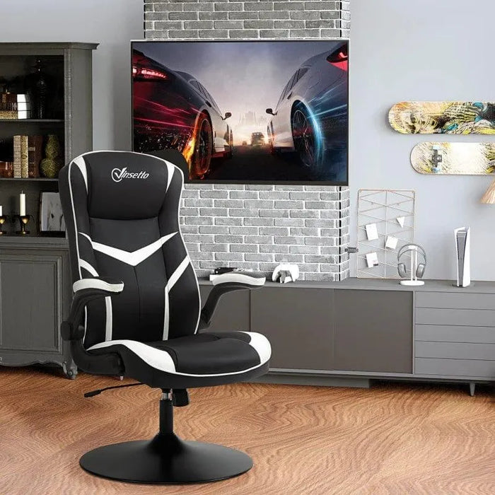 Black and white faux leather gaming chair with flip-up armrests in a modern living room.