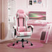 Pink and white gaming chair with footrest in modern pink gaming room by desk