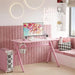 Pink gaming desk with RGB LED lights, monitor, speakers, pink PC case, and stylish decor