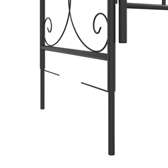 Black powder coated steel garden arch gate with decorative scroll design detail