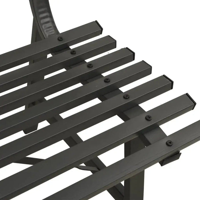 Close-up of black powder coated steel garden bench with slatted backrest design