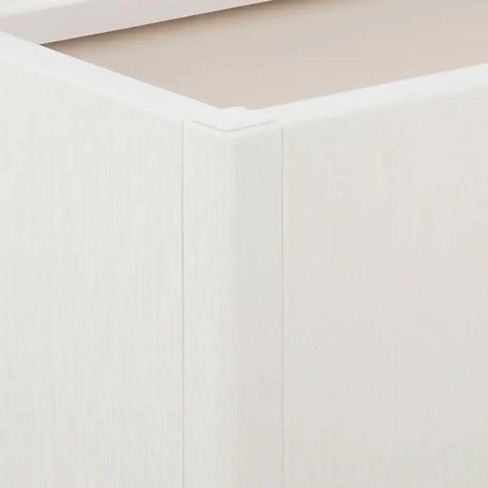 Close-up of a white garden planter box with smooth finish and clean corner joints