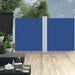 Blue double-sided retractable garden privacy screen on a wooden patio with outdoor furniture