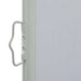 Close-up of grey outdoor retractable garden side awning privacy screen with metal frame