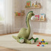 Green dinosaur plush toy in a plush playroom