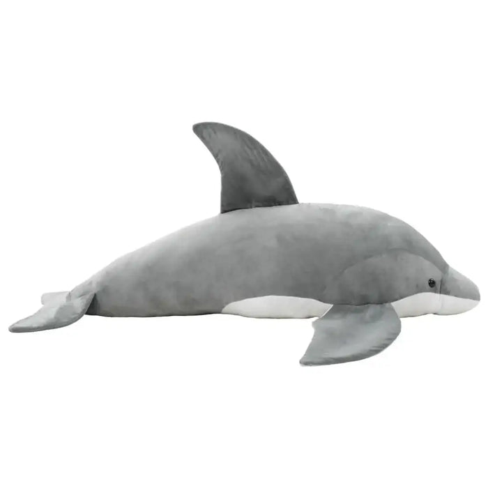 Plush dolphin toy on a white background