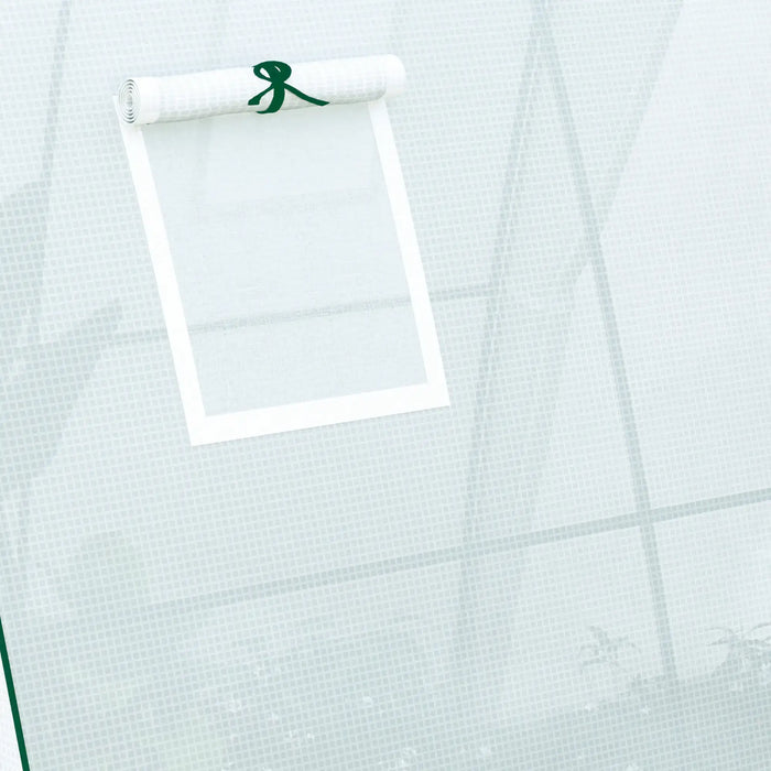 White paper with a green ribbon on a textured light gray background