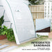 Greenhouse with integrated sandbags for added weight, surrounded by plants and garden tools.