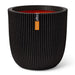 Black ribbed planter pot with capi Europe tag, double-walled recycled construction