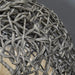 Close up of hand-woven rattan wicker cat house basket texture in grey tones