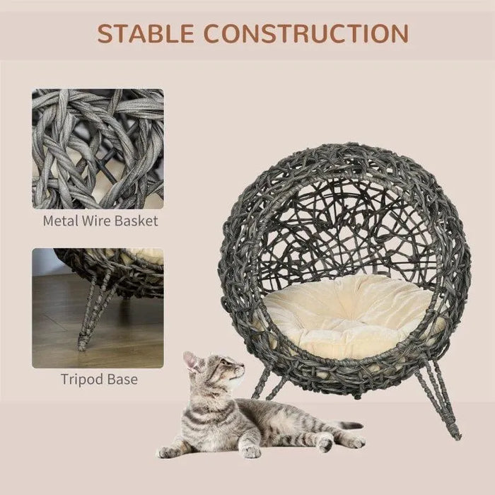 Hand-woven rattan cat house with tripod legs and cushion, wicker elevated cat basket