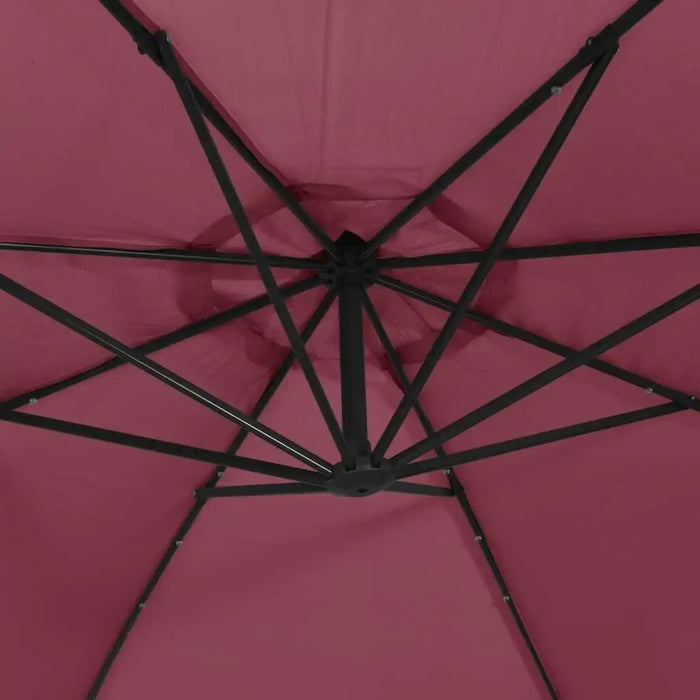 Bordeaux red hanging parasol with black frame and LED light strips