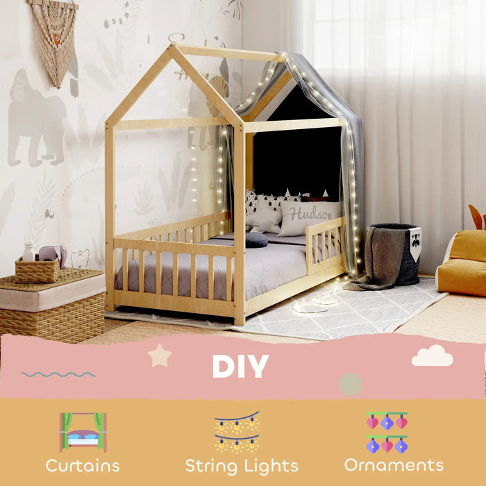 Children's room with a wooden house-shaped bed, string lights, and decorative elements.