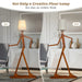 Humanoid design floor lamp with adjustable wooden joints and fabric lampshade in modern living room