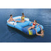 Four people relaxing on a Hydro-Force luxury inflatable floating lounger in blue water