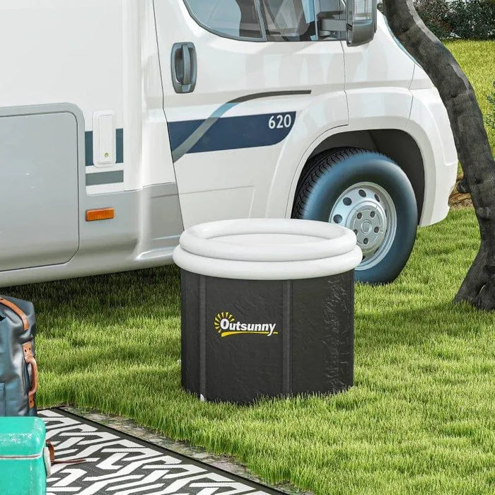 Outsunny inflatable ice tub cold plunge bath beside camper van on grass