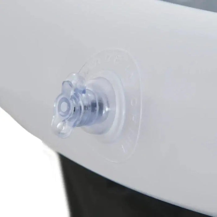 Close-up pump valve on inflatable cold plunge bath white exterior