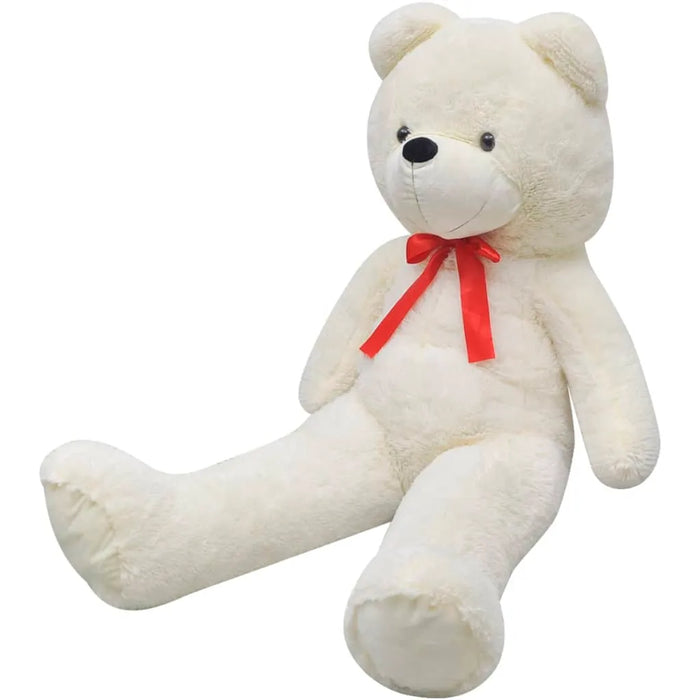 White teddy bear with a red bow on a white background