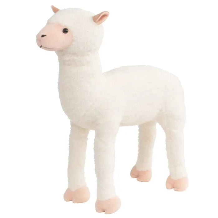 White plush toy llama on a white background