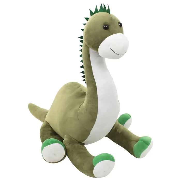 Plush dinosaur toy with green body, white belly, and black spikes on a white background