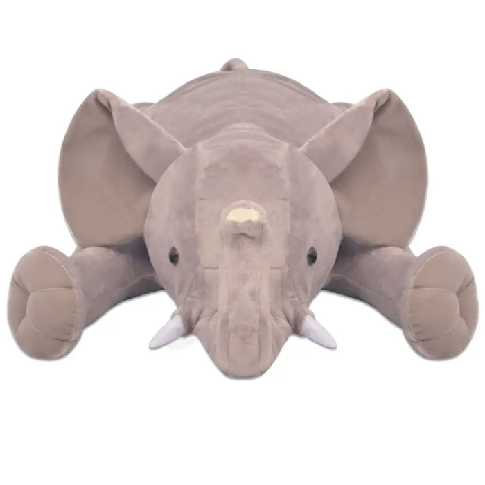 Plush elephant toy on a white background