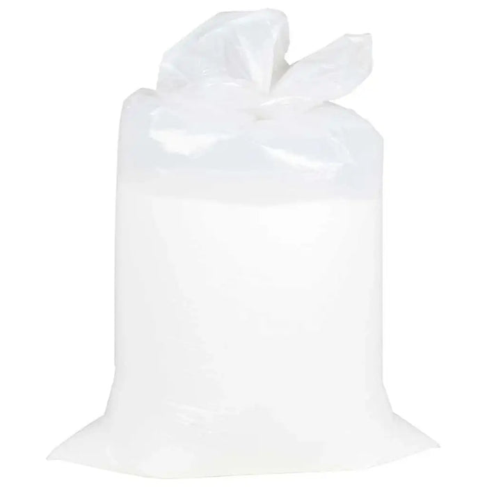 Large transparent plastic bag filled with white granulated material on white background
