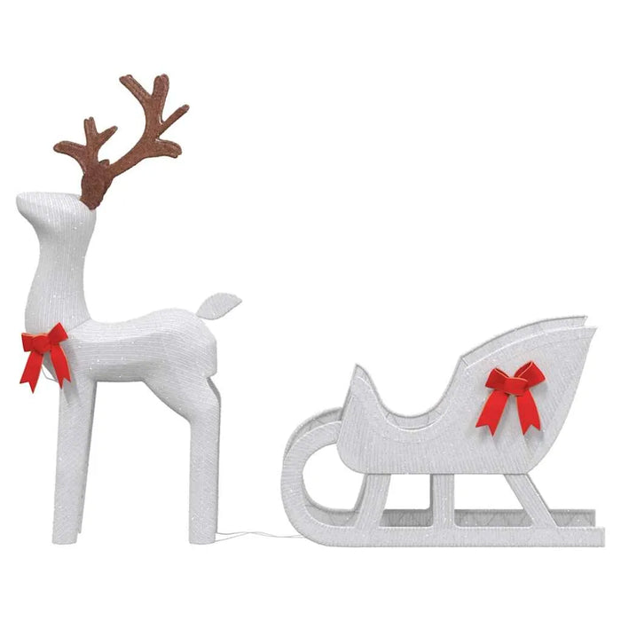 White reindeer decoration with brown antlers and red bow, pulling matching white sleigh with red bow