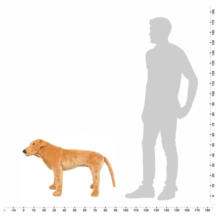 Plush dog toy next to a silhouette of a person with a measurement scale on a white background