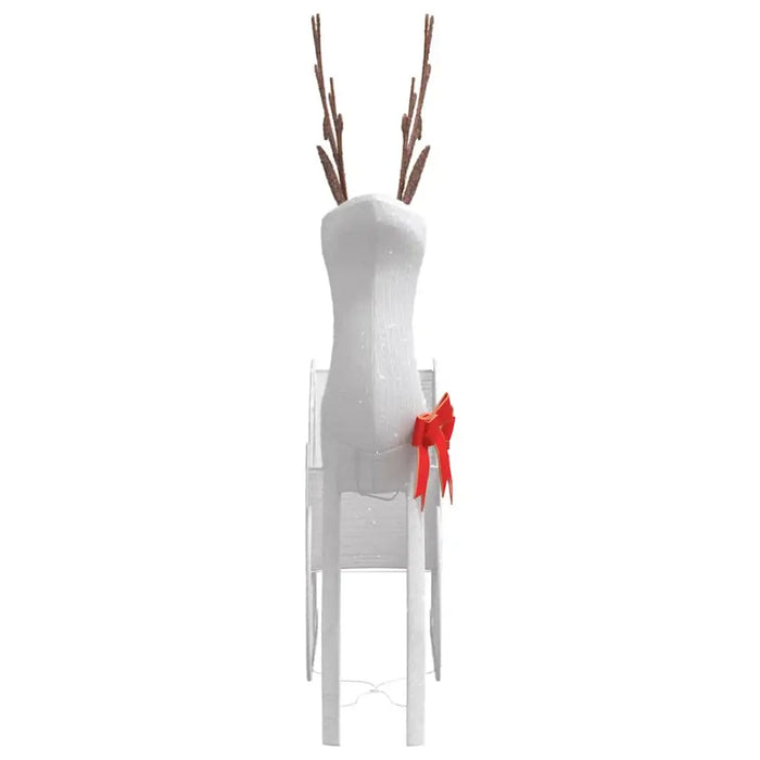 White wicker reindeer decoration with tall antlers and a red bow on the side