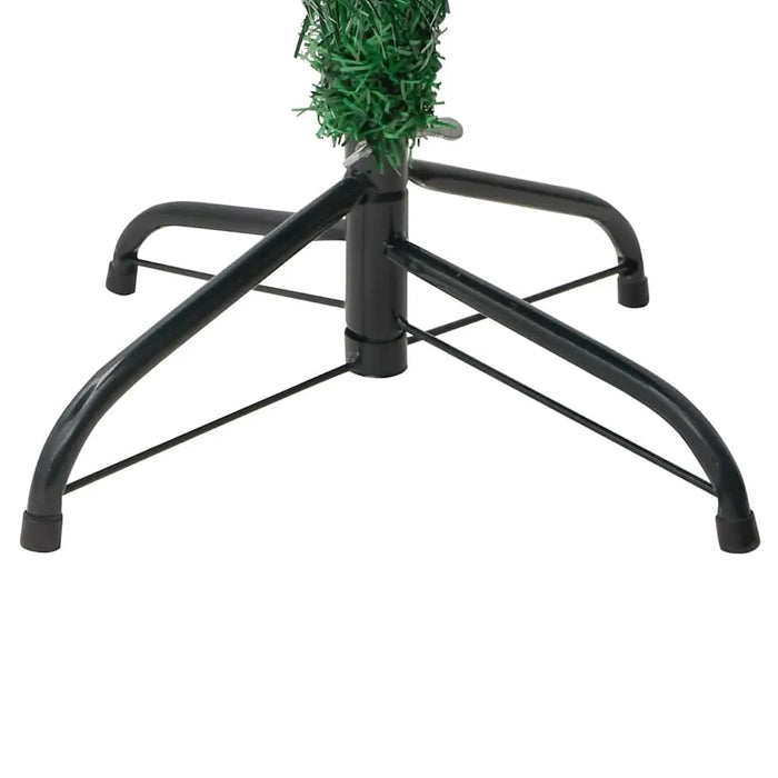 Black metal base stand supporting artificial Christmas tree with green branches on white background