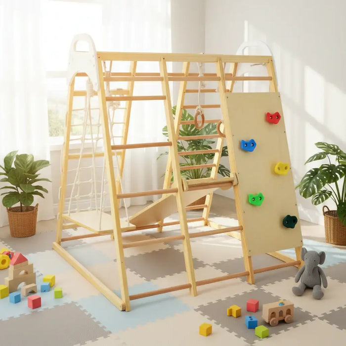 Children's play area with climbing frame, colorful blocks, and a teddy bear on a light-colored floor.